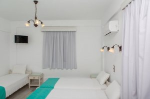 Triple Studio with 3 single beds and city view balcony