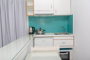 Triple Studio with 3 single beds and city view balcony