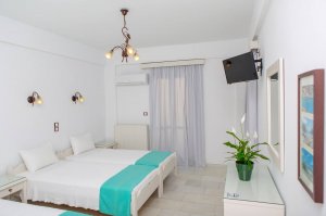 Triple Studio with 3 single beds and city view balcony