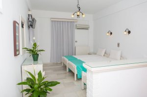 Triple Studio with 3 single beds and city view balcony