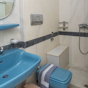 Triple Studio with 3 single beds and city view balcony