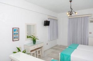 Triple Studio with 3 single beds and city view balcony