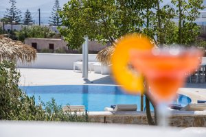 DELUXE SUITE APPARTMENT: a bedroom and a livingroom with sofabeds , with  balconies in first floor with pool and sea view.